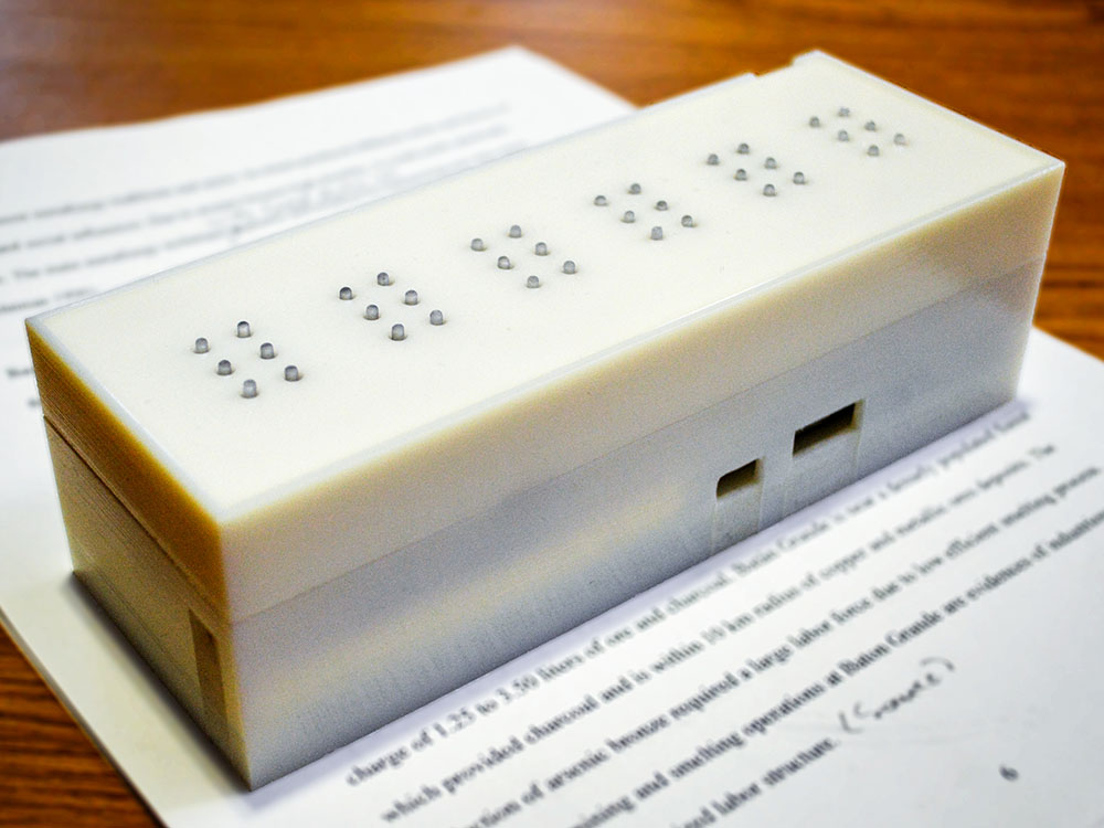 Tactile is a real time text to braille converter that translates printed text by placing the device on a printed page and then converting it to braille via digital imaging software and a special, "tactile" keyboard. 
